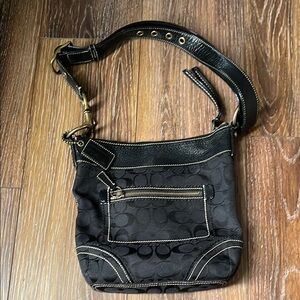 Coach Black Shoulder Bag with Adjustable Strap and Silver Hardware